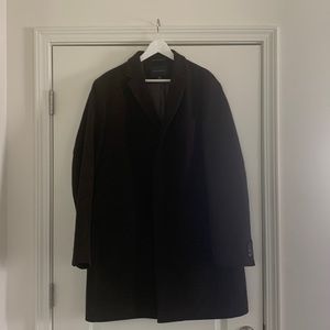 Dark brown, fully lined coat.